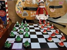 the elf is playing chess with his friends