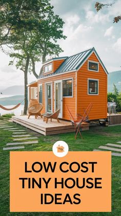 an orange tiny house with the words low cost tiny house ideas on it's front lawn