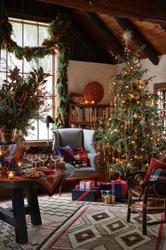 a living room filled with christmas trees and presents