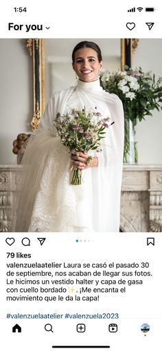 a woman in white dress holding flowers on her wedding day