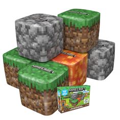 four different colored minecraft dices sitting next to each other