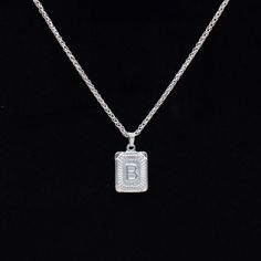 Heavy Weight Initial Slab Pendant Choker/Necklace 3.5mm Stainless Foxtail Chain Solid 3mm Thick Heavy Weight Stainless Steel Letter Pendant 4 Inch Stainless Steel Adjuster Chain Hand Made in the UK Sizing: Small 11 - 15 Inches (28 - 38cm) Medium 13 - 17 Inches (33 - 43cm) Large 15 - 19 Inches (38 - 48.5cm) Layering Earrings, O Ring Choker, Gothic Bracelet, Word Necklace, Gothic Pendant, Gothic Chokers, Bracelet Box, Gothic Earrings, Choker Pendant