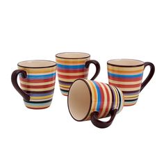 three striped coffee mugs sitting next to each other