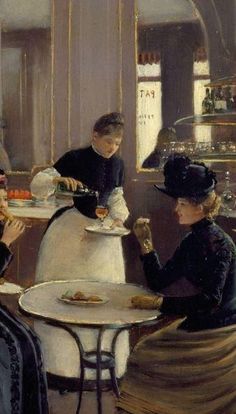 three women sitting at a table with plates of food