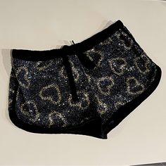 Victoria's Secret Black Gold Sequin Heart Shorts Pj's Small Nwt Relaxed Fit All Over Sequins Hand Wash Imported Polyester/Cotton. Victoria's Secret Black Short Bottoms, Trendy Fitted Victoria's Secret Bottoms, Trendy Fitted Bottoms By Victoria's Secret, Victoria's Secret Black Bottoms For Night Out, Victoria's Secret Black Summer Bottoms, 90s Athleisure, Heart Shorts, Victoria Secret Jeans, Hot Pink Shorts