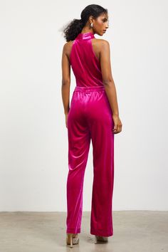 Featuring an overlapped halter neckline and slightly flared legs, this velvet jumpsuit makes a statement at any occasion. It's soft and figure-skimming, finished with slant pockets at the hips. •Halter neckline •Front pockets •Slightly flared legs •Back zip Item Number: 73752 Chic Velvet Jumpsuits And Rompers, Glamorous Halter Neck Jumpsuits And Rompers, Glamorous Halter Neck Jumpsuit, Fitted Halter Neck Jumpsuit For Loungewear, Velvet Jumpsuits And Rompers For Party, Vacation Dresses Casual, Wedding Guest Dress Trends, Skirt And Top Dress, Halter Neck Jumpsuit