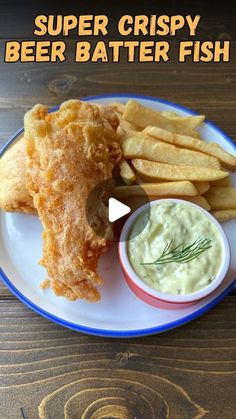 a plate with some fish and fries on it