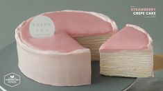 a pink cake with a thank you sign on it's top and the bottom half cut out