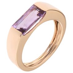 Modern band ring in 9k rose gold with a rectangular natural amethyst 1.5 ctw. The size of the gemstone is 10 x 6 millimeters / 0.393701 x 0.23622 inches. This ring is also produced with gold topaz, They can be worn as stacking rings. Us finger size 6 1/2 / Italian size 13 / French size 53. It can be adjusted to the customer's size before shipping. This ring is handcrafted in Italy by Botta Gioielli and it is stamped with the Italian Gold Mark 375 - 716MI. ________________________________________ Rose Gold Band Ring, Ring Baguette, Ring Rosegold, Gold Topaz, Ringe Gold, Big Rings, Rose Gold Band, Gold Band Ring, Deco Engagement Ring