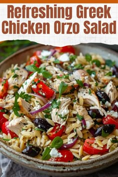 a bowl filled with chicken orzo salad on top of a table