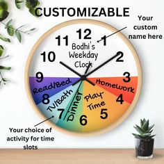 a clock with the words customizable on it next to a potted plant