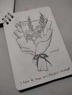 a notepad with a drawing of flowers on it and the words i hope he buys you flowers