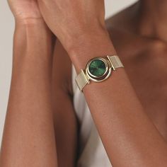 ECLIPSE Emerald Watch in Yellow Gold | VANNA Watch With Green Face, Modern Watches With Rotating Bezel For Gift, Modern Green Watches For Gift, Modern Jewelry With Rotating Bezel For Gift, Green Watch With Metal Dial As Gift, Green Watch With Metal Dial For Gift, Rose Gold Round Metal Jewelry And Watches, Elegant Green Watch As A Gift, Elegant Green Watch For Gift