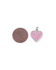 A heart shaped charm with a pink enamel zodiac design. Dimensions: 18mm Pink Heart Charms For Valentine's Day, Heart-shaped Pink Charms For Valentine's Day, Pink Heart Sterling Silver Charms, Pink Heart-shaped Sterling Silver Charms, Pink Sterling Silver Heart Charm, Sterling Silver Heart Charm In Pink, Personalized Pink Heart Charms, Pink Enamel Heart Pendant Jewelry, Pink Heart Pendant Charms As Gift