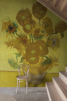 Elevate your space with the timeless beauty of Van Gogh's iconic sunflowers. This stunning wallpaper captures the vibrant colors and textured brushstrokes of the original masterpiece, bringing a touch of artistic elegance to your home. Yellow wallpaper mural.