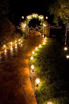 an image of a path that is decorated with lights