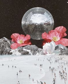 there are many people standing in the snow and one is holding a disco ball with flowers on it