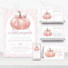 a baby shower with pink pumpkins on the front and back, next to an iphone