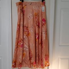 New Flict & Moss Peach Maxi Skirt With Peach And Gold Flowers Peach Bottoms For Spring Vacation, Feminine Peach Skirt For Spring, Peach Satin Skirt, Spring Peach Long Skirt, Spring Peach Flowy Skirt, Silk Floral Print Flowy Maxi Skirt, Peach Lined Skirt, Tropical Rugs Peach, Y2k Boho