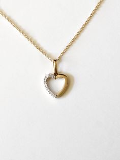 The floating heart necklace is made of 14k gold and adorned with tiny diamonds in pave setting. The delicate cable chain is also 14k gold in the color of your choice. Ideal as a gift for a special someone or to yourself. - available in 14k yellow, white, and rose gold - I can also use silver or gold filled chains. Please feel free to leave me a message so I can give you the price. - I always upgrade the shipping to Priority mail for orders of $100 or more - comes in a little box and ready for gi 16 Inch Necklace, Rancho Cucamonga, Tiny Diamond, Station Necklace, Pave Setting, Beautiful Heart, Simple Necklace, Gold Filled Chain, Cable Chain