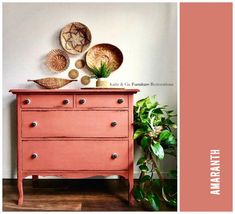 an old dresser painted pink with some decorative items on top