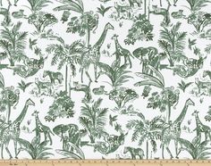 a green and white jungle print fabric