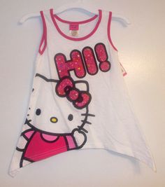 NEW WITH TAGS Hello Kitty Tank Top SIZES:S 6/7 or M 8/10 100% Cotton 00%Polyester YOU WILL RECEIVE ONE ITEM THANK YOU FOR SHOPPING IN MY STORE  I also have many great items in my store Fun White Cotton Tank Top, Playful White Cotton Tank Top, Pink Sleeveless School Top, Sleeveless Pink School Top, Sleeveless Pink Top For School, Cute Sleeveless School Tops, Playful Sleeveless Top With Hello Kitty Print, Cute White Tank Top, Hello Kitty Tank Top