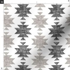 an abstract black and white pattern with triangles