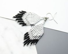 Hey, I found this really awesome Etsy listing at https://www.etsy.com/listing/937523548/black-and-white-earrings-woven-earrings Minimalist White Beaded Dangle Earrings, Silver Minimalist Beaded Earrings, Minimalist White Beaded Earrings As Gift, Minimalist White Beaded Earrings Gift, Minimalist White Beaded Drop Earrings, Minimalist White Beaded Earrings For Gifts, Earring Inspired, Earrings Casual, Woven Earrings