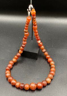 The Beautiful Roman's Era Dynasty Red Carnelian Agate Stone Jewelry Beads Necklace. The Age Of This Beads Are More Than 2000 Years Old. Conditions Of Beads As Shown In The Pictures. Rich In Patina. Round Carnelian Necklace With Polished Beads, Carnelian Gemstone Beads Necklace, Carnelian Gemstone Beaded Necklaces, Red Carnelian Round Beads, Red Polished Carnelian Beads, Carnelian Beaded Necklaces With Gemstone Beads, Polished Red Carnelian Beads, Carnelian Beaded Necklace With Polished Round Beads, Carnelian Polished Beads Necklace