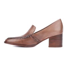 The Elaine exudes sophistication with its hybrid heeled loafer design, making it a timeless addition to your wardrobe. Crafted from luxurious genuine leather, this shoe features a visible whip-stitch detail that enhances its classic appeal. Perfect for elevating both professional and casual outfits, the Elaine combines elegance and comfort, ensuring you step out in style. Whether for the office or an evening out, this heeled loafer is a must-have for the discerning fashionista. Workwear Loafers With Wooden Heel And Round Toe, Leather Loafers With Wooden Heel For Work, Classic High Heel Loafers With Stacked Heel, Leather Loafers With Wooden Heel And Round Toe, Classic High-heel Loafers With Stacked Heel, Classic Leather Shoes With Deep Heel Cup For Work, Fall Workwear Leather Shoes With Deep Heel Cup, Leather Loafers With Deep Heel Cup For Office, Brown Stacked Heel Loafers For Work