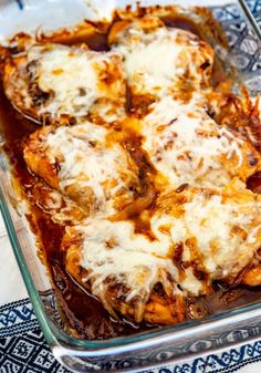 a casserole dish with meat and cheese in it