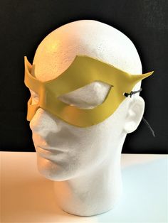 DESCRIPTIONSpeed around town in a yellow mask for supervillian Professor Zoom, Reverse Flash! Great for Halloween or Marvel Firestar at Comicon. **We also sell this mask with a red lightning bolt!** Or, perhaps you need a plain yellow mask for Masquerade Ball. Get this style in any color. Waterproofed leather, glossy or matte finish, & several choices to affix the mask (cord, elastic, ribbon, waterproof cord, stick, or no holes for adhesive). Measurements: 3.25" high x 10.5" wide (tallest &a Marvel Firestar, Mask For Masquerade Ball, Professor Zoom, Mask Cord, Mask For Masquerade, Flash Superhero, New Years Eve Ball, Eobard Thawne, Plain Yellow