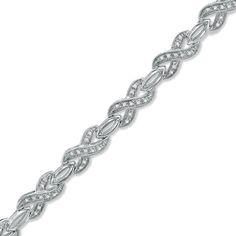 Representing the fierce attraction that brought you together, this exquisite bracelet pairs shimmering diamond-embellished "X" links with polished oval-shaped links. Buffed to a brilliant shine, this gorgeous 1/3 ct. t.w. diamond design measures 7.0 inches long and secures with a lobster claw clasp. Silver Diamond Oval Link Bracelet, Silver Diamond Bracelet With Oval Links, Silver Oval Link Diamond Bracelet, Formal Infinity Diamond Bracelet, Infinity Diamond Bracelet For Formal Occasions, Silver Diamond Bracelet For Anniversary, Silver Diamond Bracelet With Diamond Accents, Silver Oval Link Diamond Bracelet For Anniversary, Silver Diamond Bracelet With Oval Link And Diamond Accents