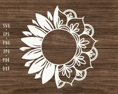 the sunflower is cut out from wood and ready to be used as a stencil