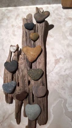 rocks are arranged in the shape of a tree trunk