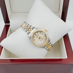 Women's Rolex 26mm DateJust 18K Gold / Two-Tone Stainless Steel Watch, with Beige Diamond Dial, and Diamond Bezel. Includes Mahogany Box and In-House Certificate.. Pre-Owned SN# ******* Brand: Rolex. Crystal: Sapphire. Gender: Women's. Dial Color: Beige. Movement: Self-Winding. Case Dimensions: 26mm. Metal Type: Stainless Steel and 18K Yellow Gold. Bracelet / Strap: Original Jubilee 18K Gold / Stainless Steel. Box / Certification: Mahogany Box / In-House Certificate. Warranty: 1 Year Limited War Rolex 26mm, Rolex Watches Women, Rolex Women, New Rolex, Bezel Diamond, Watch Movement, Steel Watch, Stainless Steel Watch, Watch Brands