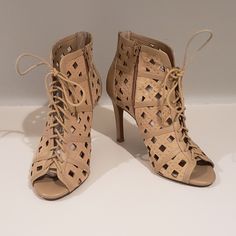 Brand: Gianni Bini Size: Women's 8 Color: Nude / Beige / Tan Style: Peep Toe, Lace Up Ankle Bootie With Laser-Cut Design Material: Leather Lining, Man Made Condition: New Without Tags, However, Bottom Of Heel Is Slightly Scuffed Due To Moving Shoes Around In Closet (See Photo #6). Not Visible When Wearing. Summer Fitted Booties With Round Toe, Spring Party Booties With Almond Toe, Spring Party Booties With Reinforced Heel, Spring Party Booties With Round Toe, Fitted Beige Lace-up Heels, Spring Fitted Ankle-high Sandals, Fitted Closed Toe Spring Booties, Elegant High Heel Spring Booties, Elegant High Heel Booties For Spring