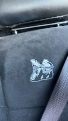 the emblem on the seat of a car