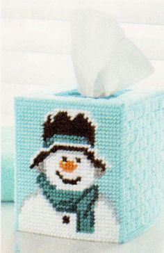 a tissue box with a snowman on it