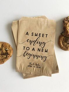 some cookies and a bag with the words a sweet ending to a new beginning