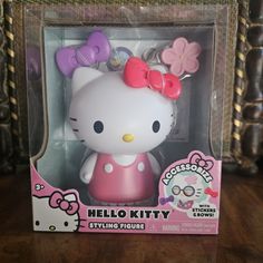 the hello kitty toy is in its box