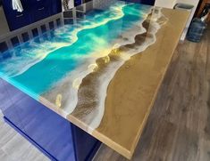 a counter top with an ocean scene painted on it