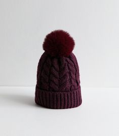 New Look Burgundy Faux-Fur Pom Pom Bobble Hat. Cold weather ready, this cosy bobble hat is made from a soft knit with a faux fur pom pom.  Material: soft cable knit, faux fur Colour: burgundy Design: faux fur pom pom, rib trim  Good To Know: matching items available. Burgundy Design, New Look Dresses, Bobble Hat, Bobble Hats, Good To Know, Boho Floral Dress, Faux Fur Pom Pom, Denim Gift, 20's Dress