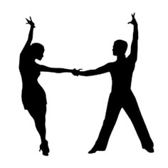 two people are dancing with their arms in the air