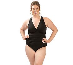 Hit the beach in confidence and style thanks to this classic one-piece swimsuit featuring a V-neck and sewn-in cups. It's crafted from stretchy, form-fitting fabric for a just-right fit. From Dolfin. V-neck Swim Dress With Built-in Bra For Pool, V-neck Swimwear With Built-in Bra For Poolside, Stretch V-neck Tankini For Swimming, Fitted V-neck Swimwear For Pool, Stretch V-neck Bodysuit For Sunbathing, V-neck Swim Dress With Built-in Bra, Fitted V-neck Swimwear With Built-in Bra, Stretch V-neck Shapewear Swimwear, Stretchable Swimwear With Lined Body For Pool