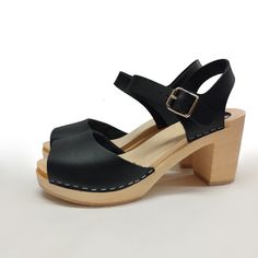 Clogs sandals for Women  HIGH heels  ergonomic wooden sole and black leather. peep toe SALE - last pairs. Available in sizes 36-41. EUR 35 l UK 2.5 l AUS 4.5 l USA 5 l up to 22.3cm l 8.78 inches  EUR 36 l UK 3.5 l AUS 5.5 l USA 6 l up to 23cm l 9.02 inches EUR 37 l UK 4 l AUS 6 l USA 6.5 l up to 23.7cm l 9.33 inches  EUR 38 l UK 5 l AUS 7 l USA 7.5 l up to 24.5cm l 9.65 inches EUR 39 l UK 6 l AUS 8 l USA 8.5 l up to 25.3cm l 9.96 inches EUR 40 l UK 7 l AUS 9 l USA 9 l up to 25.9cm l 10.2 inches EUR 41 l UK 7.5 l AUS 9.5 l USA 9.5 l up to 26.6cm l 10.47 inches EUR 42 l UK 8 l AUS 10 l USA 10.5 l up to 27.2cm l 10.69 inches Hand crafted women's clogs are made using VEGAN LEATHER upper and WOOD sole. Durable and stylish. All shoes have been carefully crafted from the highest quality materials Black Clogs With Ankle Strap And Leather Sole, Black Ankle Strap Clogs With Leather Sole, Black Clogs With Removable Insole And Ankle Strap, Open Toe Clogs With Wooden Heel Medium Width, Black High Heel Clogs With Heel Loop, Medium Width Open Toe Clogs With Wooden Heel, Black Clogs With Wooden Heel And Medium Width, Black Open Toe Clogs With Heel Strap, Black Clogs With Heel Loop And Open Heel