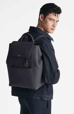 A chic and ultra-spacious office companion to refine your work-from-anywhere style. The Large Soft Backpack, handcrafted entirely from full-grain European leather, reimagines The Mini Soft Backpack with enhanced storage capability and increased all-day comfort. Featuring magnetic closure, a padded laptop sleeve to secure devices up to 16" and priority and zipped pockets to house valuables, the elegant carryall caters to every professional need. Crafted entirely from full grain sustainable DriTan Spacious Office, Backpack Free, Leather Ideas, Men's Watches Luxury, Technology Wallpaper, Nautical Stripes, Gold Hands, Leather Key, Laptop Sleeve