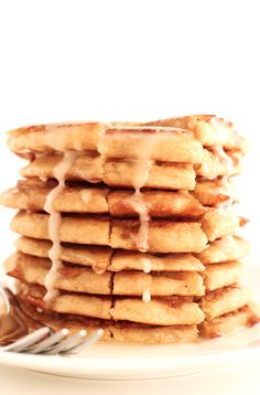 a stack of waffles with icing on top