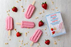 strawberry cheese yogurt popsicles with granola on the side